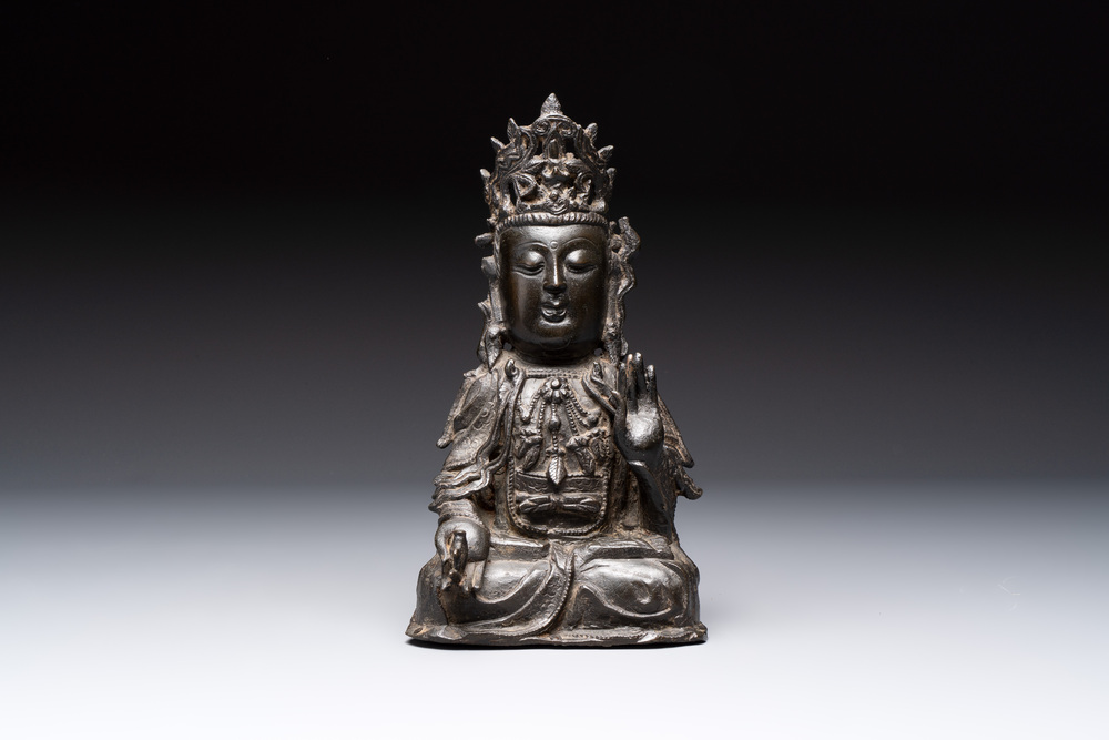 A Chinese bronze seated Guanyin, Ming