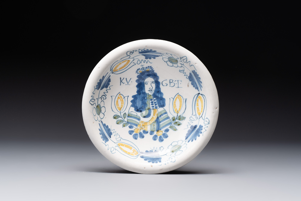 A rare polychrome Dutch Delft 'King William' dish inscribed 'KV GBT', 17th C.