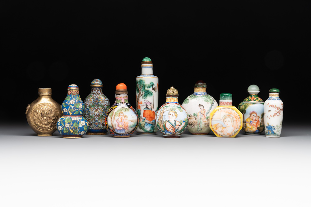 A collection of ten Chinese Canton enamel and porcelain snuff bottles, Qianlong mark, 19/20th C.