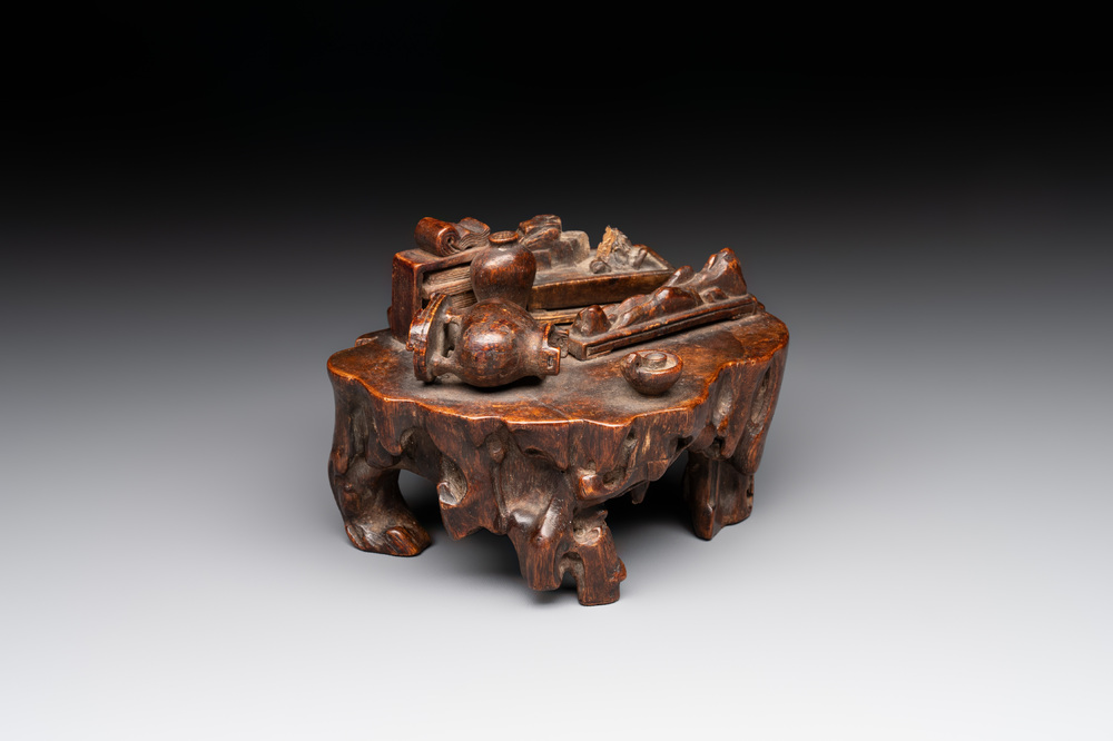 A Chinese agarwood carving of a miniature table with antiquities, 18/19th C.