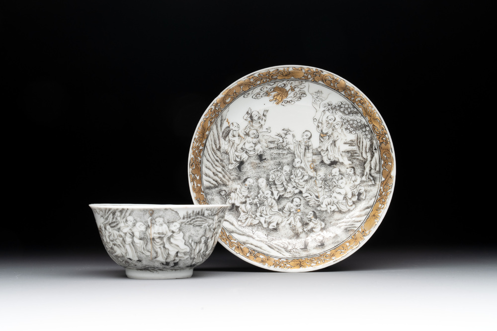 A fine Chinese grisaille and gilt '18 Luohan' cup and saucer, Yongzheng