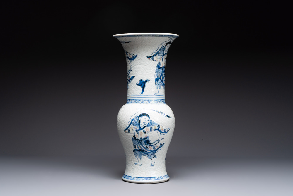 A Chinese blue, white and copper-red 'Liuhai' 'yenyen' vase, Kangxi