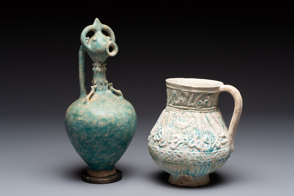 A green-glazed and a turquoise-glazed Kashan jug, Persia, 12/13th C.