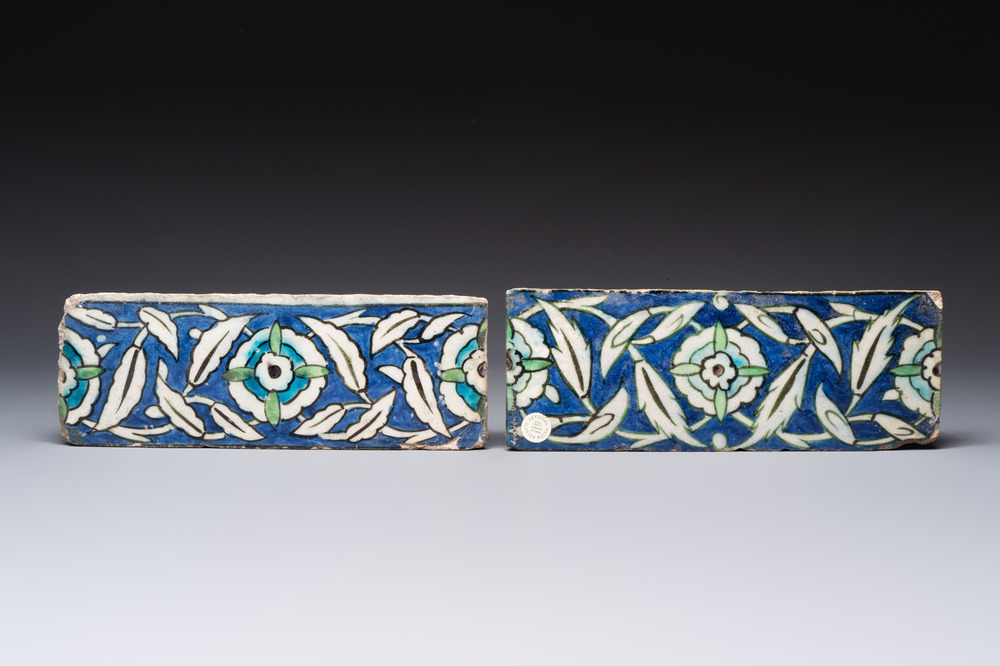 Two polychrome Damascus pottery border tiles with floral design, 17th C.