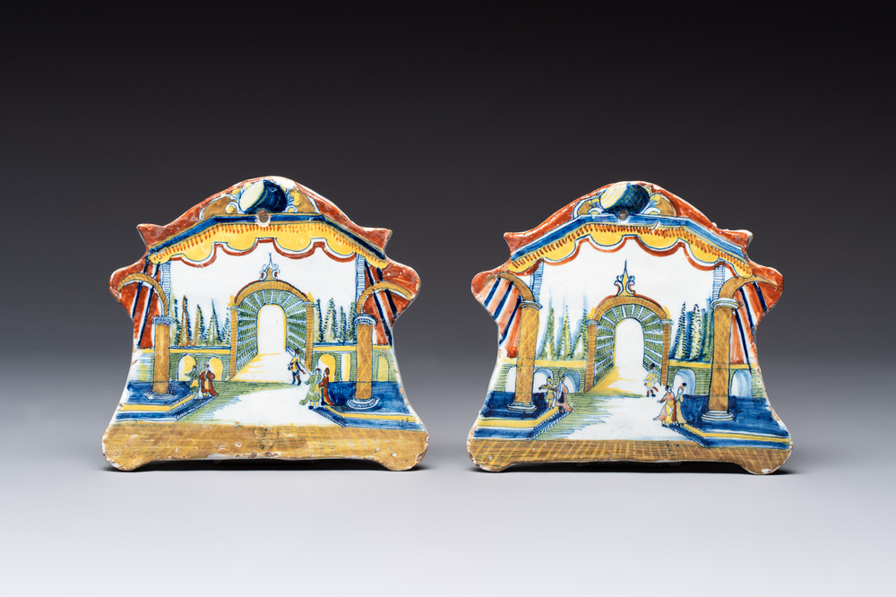 A fine pair of polychrome Dutch Delft 'theater' plaques, 18th C.