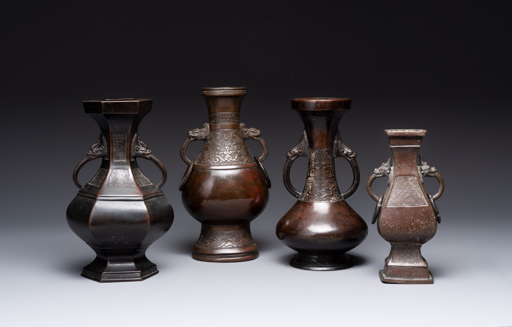 A Chinese archaistic bronze vase and three Japanese bronze vases, 14/18th C.