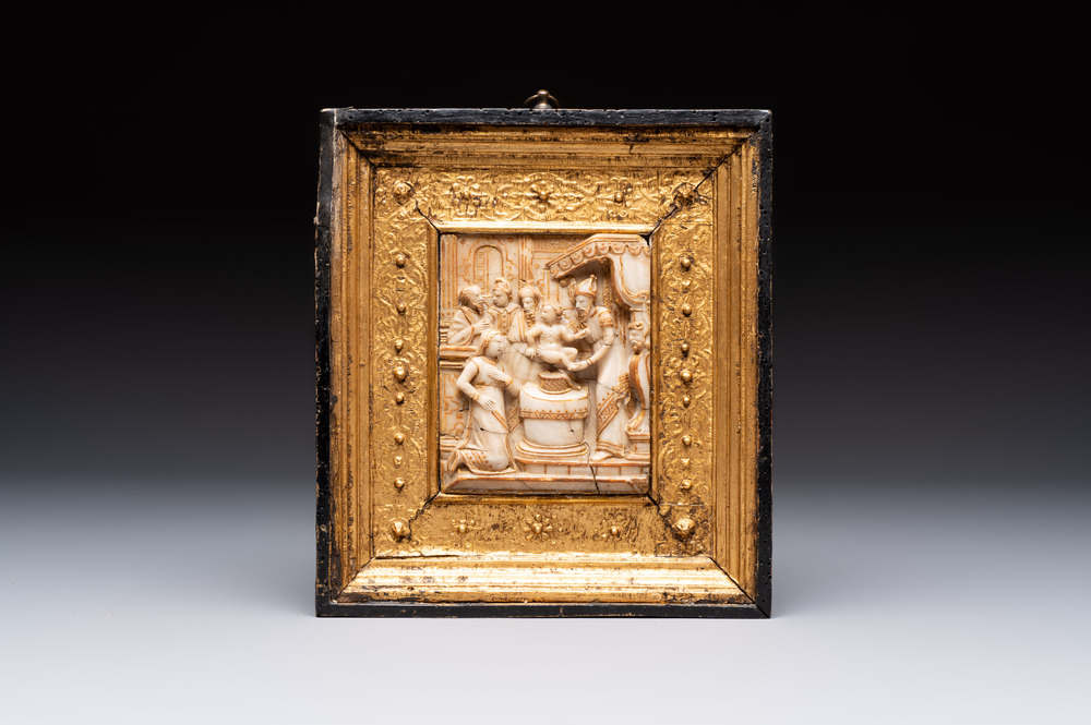 A fine gilt-heightened alabaster 'Circumcision' carving with original frame, Mechelen, 16/17th C.