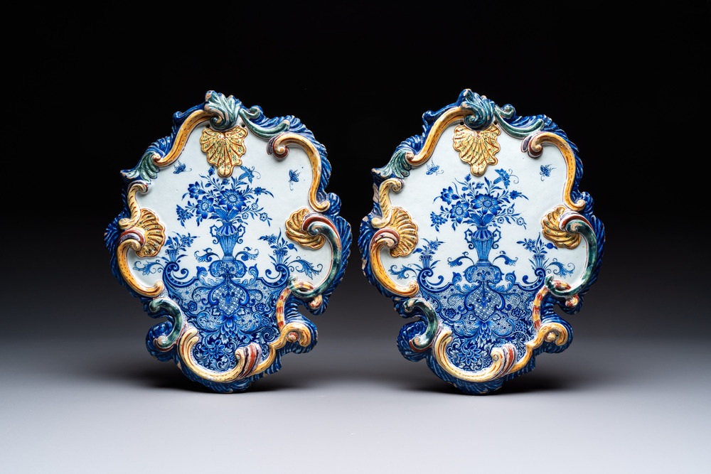 A pair of polychrome Dutch Delft mixed technique 'flower vase' plaques, ca. 1750