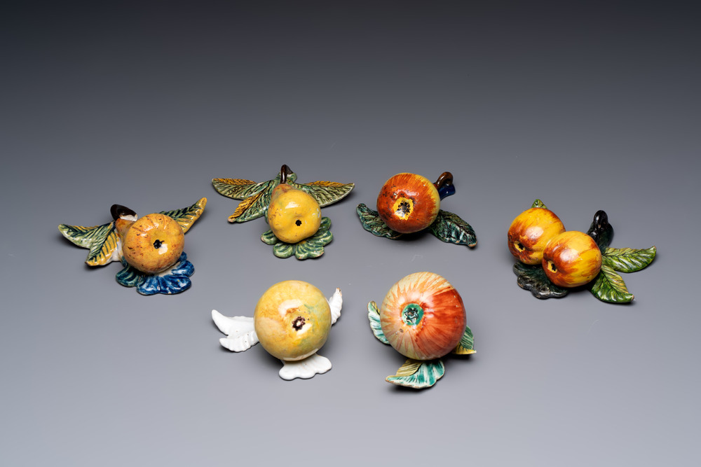 A collection of six polychrome Dutch Delft hanging fruits, 18th C.