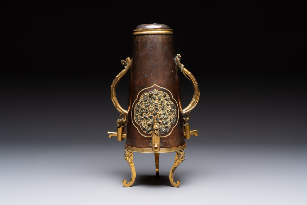A rare and fine Chinese partly-gilt copper chocolate pot with tripod stand, 18th C.
