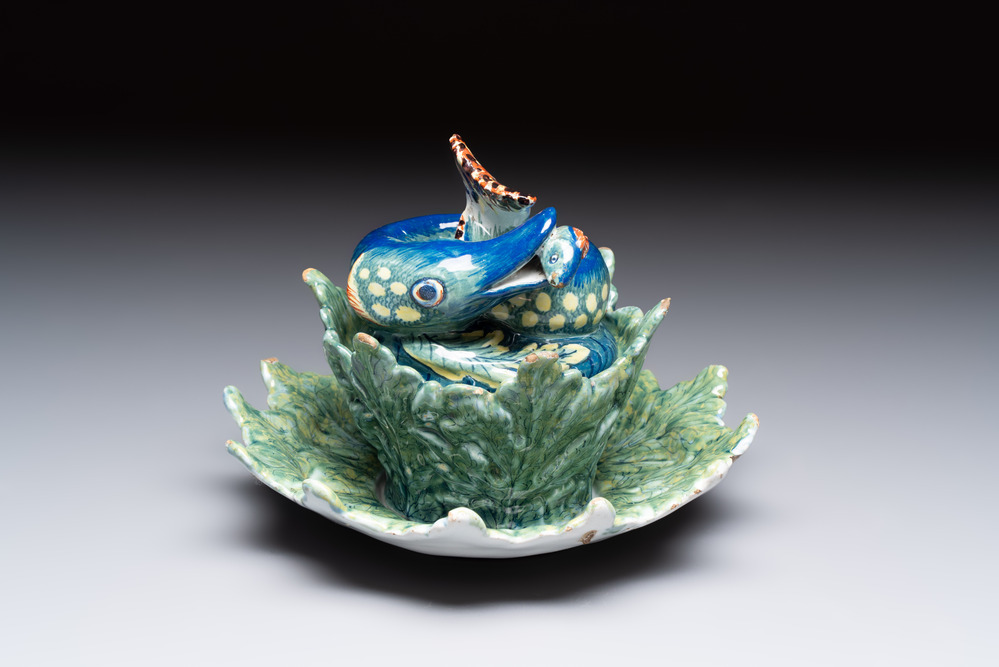 A rare polychrome Dutch Delft pike tureen and cover on stand, 18th C.