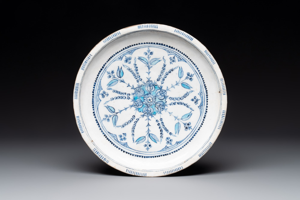 A blue, white and turquoise Iznik pottery dish with floral design, Turkey, late 16th C.