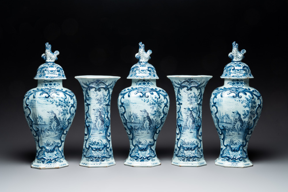 A large blue and white Dutch Delft garniture of five vases and covers, 2nd half 18th C.