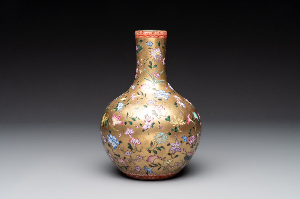 A Chinese gilt-ground famille rose vase with floral design, Qianlong mark and possibly of the period