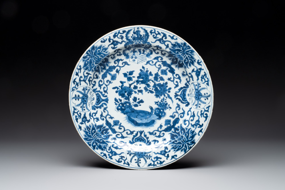 A Chinese blue and white armorial dish with the arms of Pelgrom for the Dutch market, Kangxi