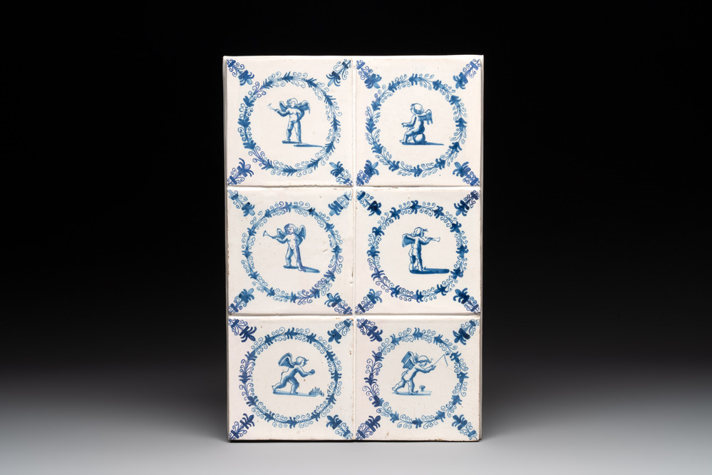 An attractive field of six blue and white Dutch Delft 'cherub' tiles, Haarlem, 17th C.