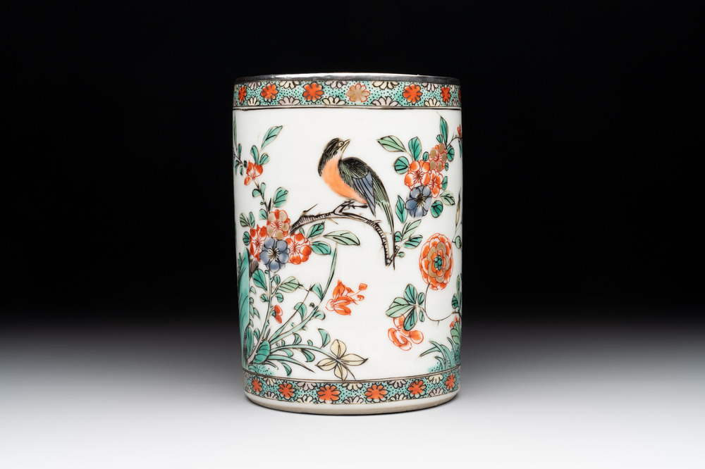 A Chinese famille verte 'bird and flowers' brush pot with silver mount, Kangxi