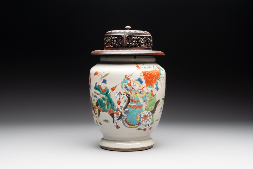 A Chinese famille rose 'warrior on horseback' vase and a wooden cover, Yongzheng/Qianlong