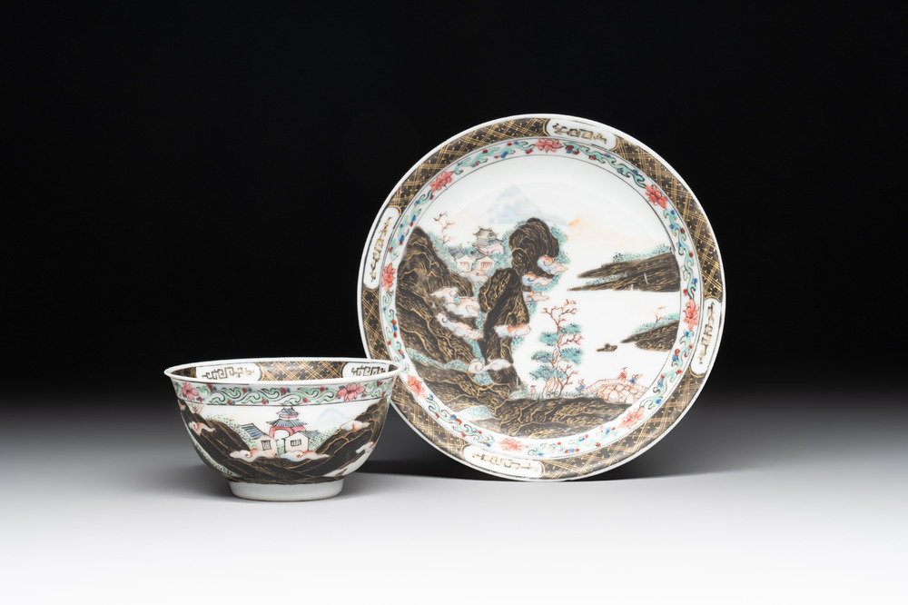 A Chinese famille rose and grisaille 'mountainous landscape' cup and saucer, Yongzheng