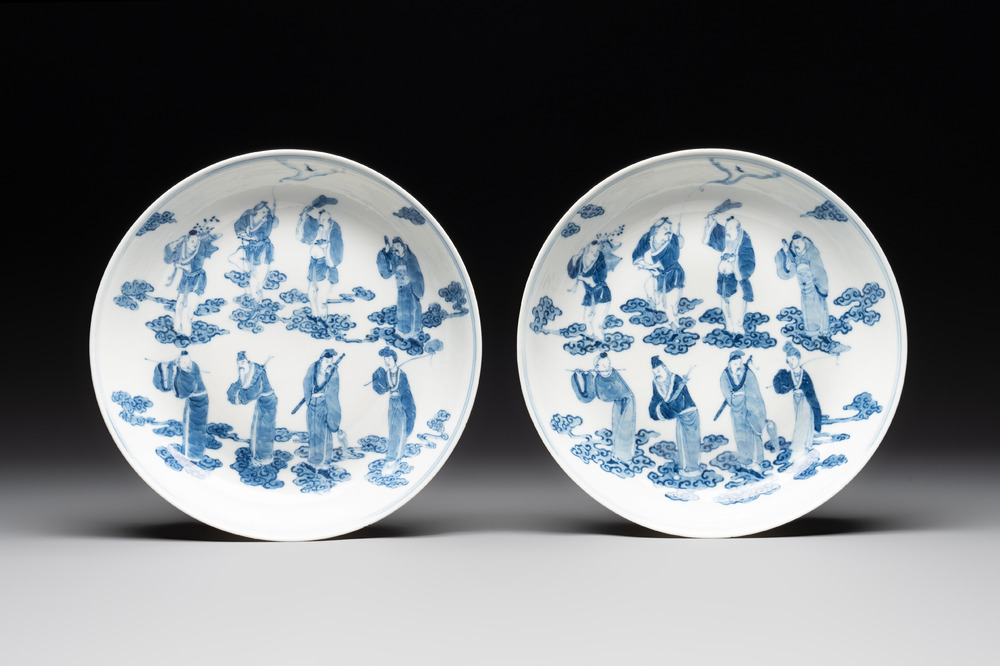 A pair of Chinese blue and white 'Eight Immortals' plates, Kangxi mark, 19th C.