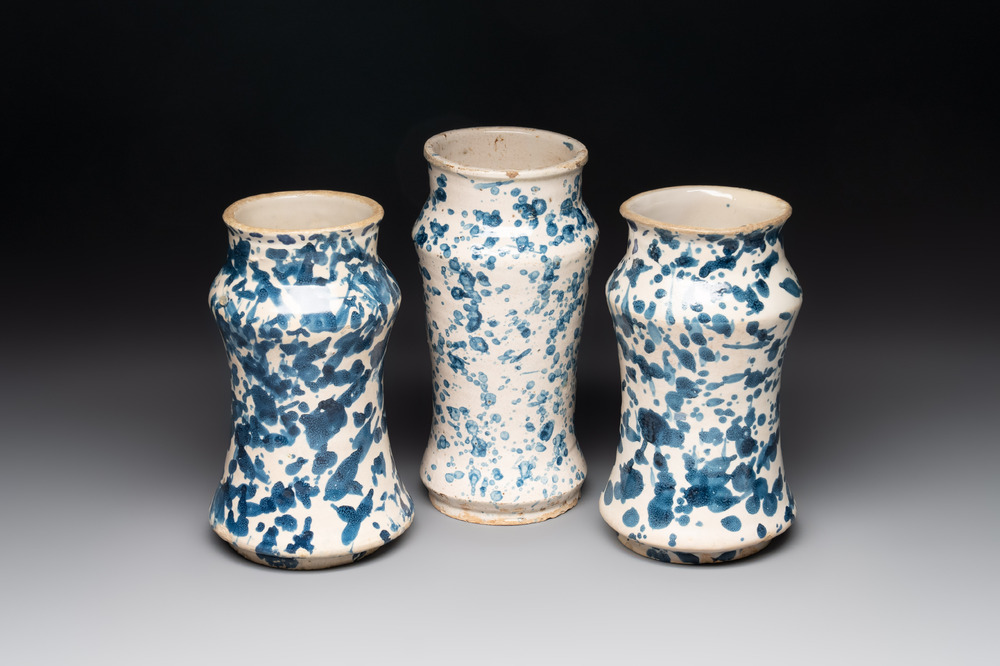 Three blue and white splash-glazed albarelli, Spain, 17th C.