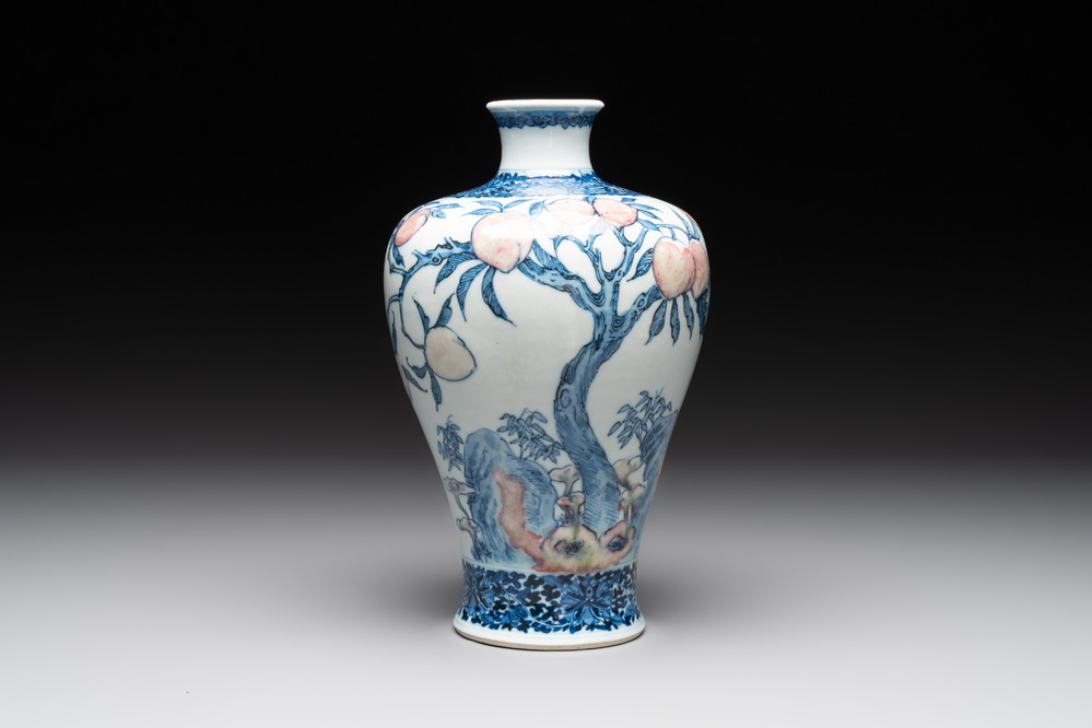 A Chinese blue, white and copper-red 'meiping' vase with 17 peaches, Yongzheng mark, 19/20th C.