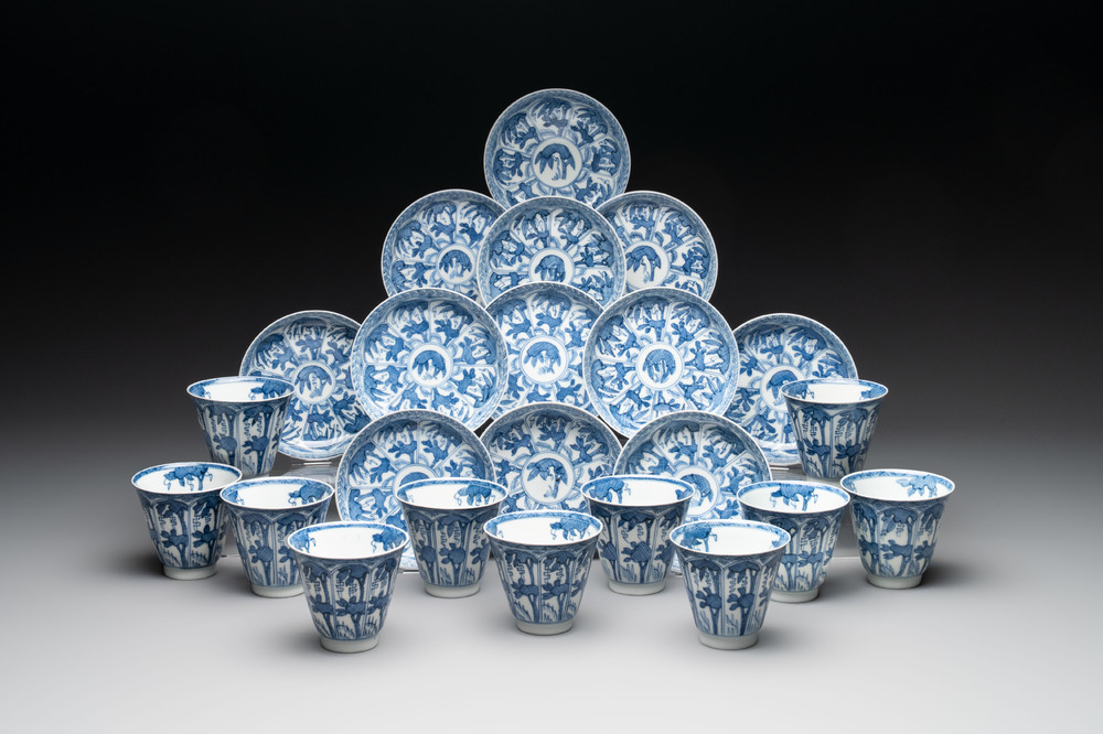 11 Japanese blue and white cups and 12 saucers with floral design, Chenghua mark, Meiji, 19th C.