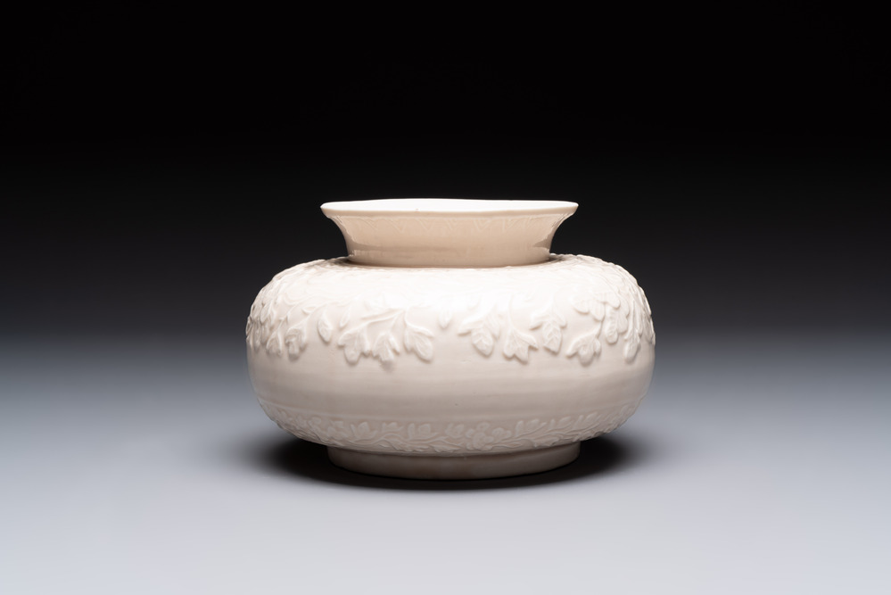 A rare Chinese Dehua blanc de Chine vase with floral design, Kangxi
