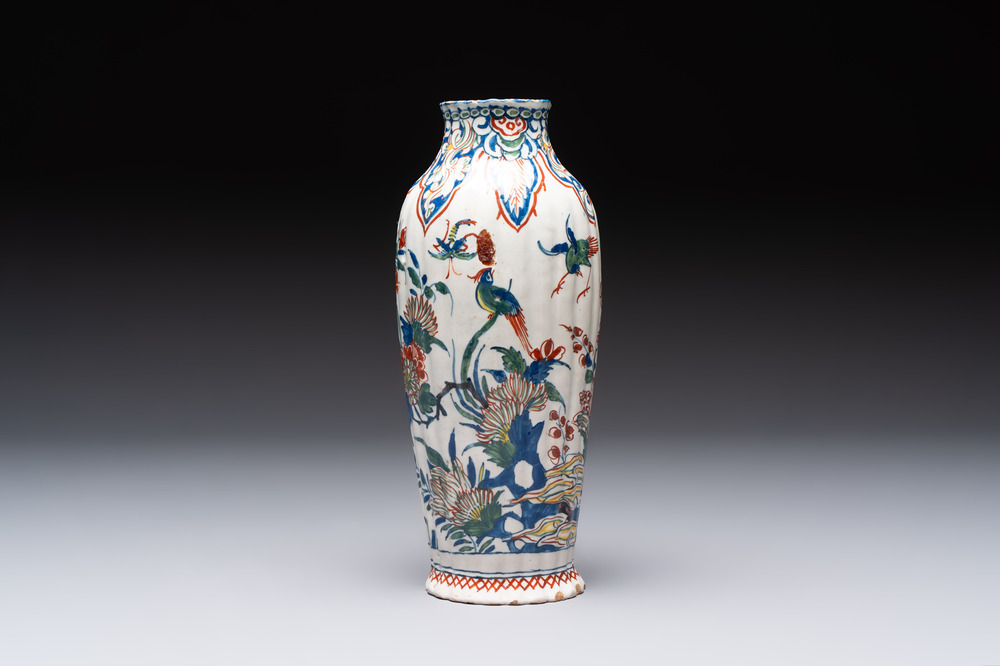 A fine polychrome Dutch Delft cashmere palette ribbed vase with birds among flowering branches, early 18th C.