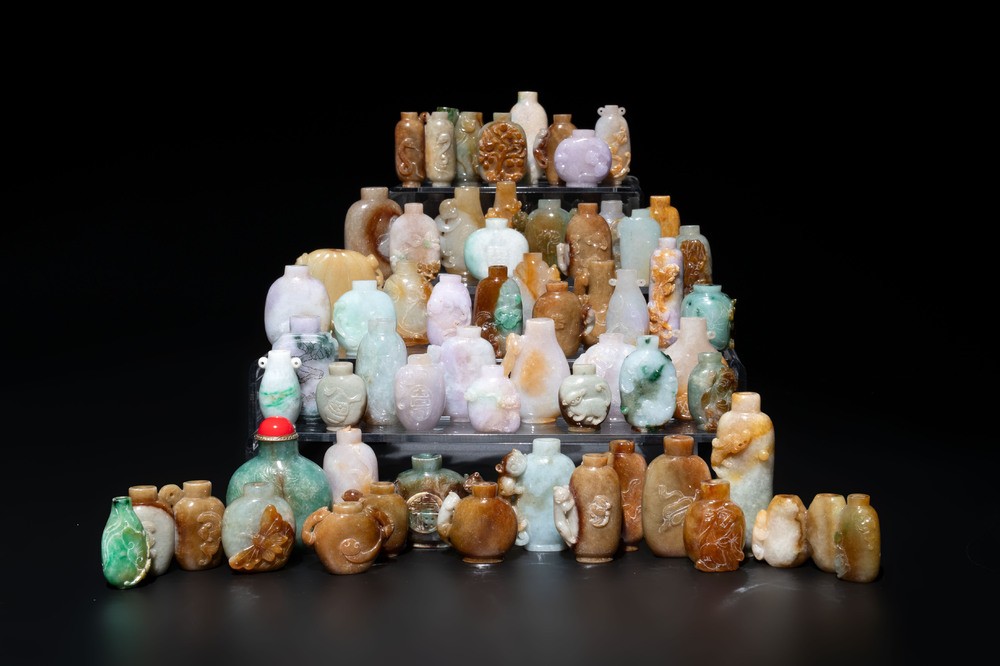 A large collection of 60 Chinese jadeite snuff bottles, 20th C.