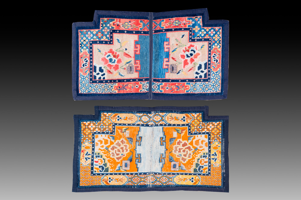 Two Tibetan saddle rugs with floral design, 19th C.