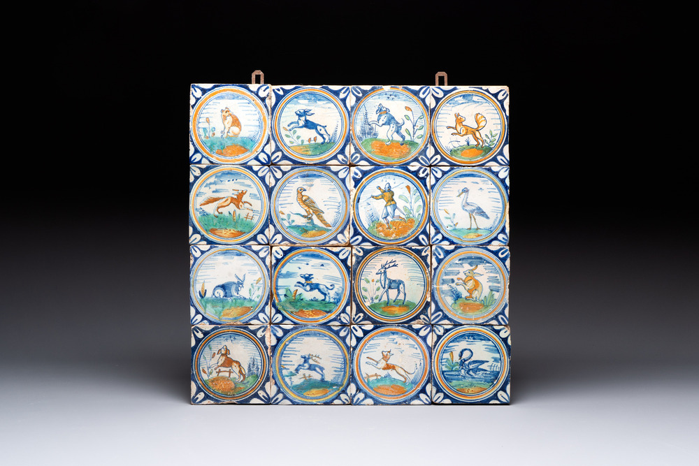 A field of 16 polychrome Dutch Delft medallion tiles with animals and a pikeman, 17th C.