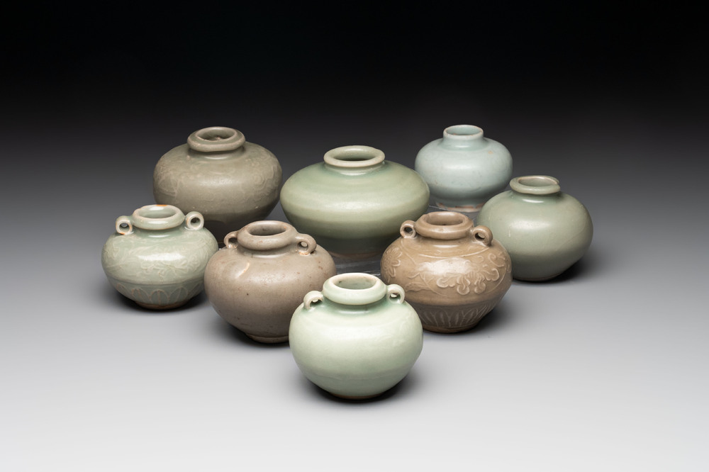 Eight Chinese Longquan celadon jarlets with floral design, Song/Yuan