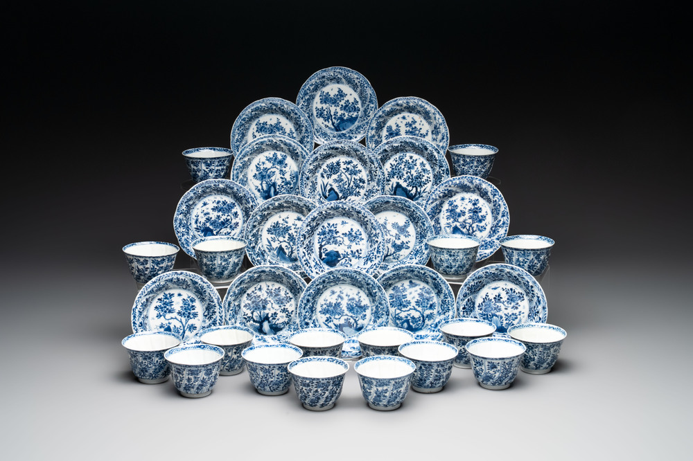 18 Chinese blue and white cups and 16 saucers with floral design, jade mark, Kangxi