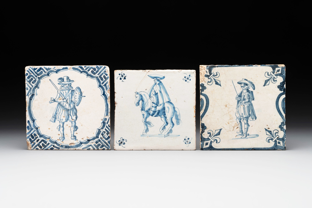 Three fine blue and white Dutch Delft 'soldier' tiles, 17th C.