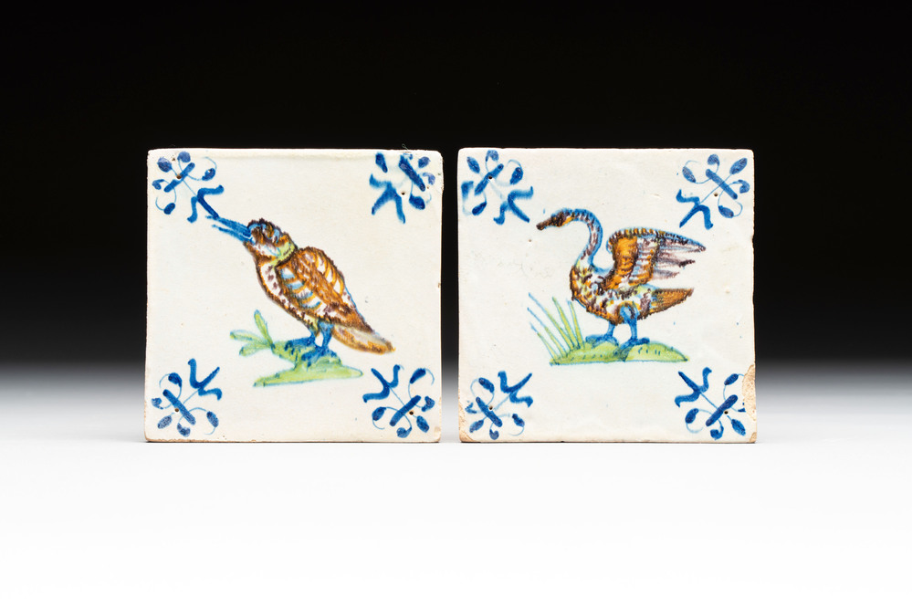 Two polychrome Dutch Delft 'kingfisher' and 'swan' tiles, 17th C.
