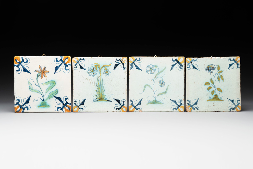 Four polychrome Dutch Delft 'flower' tiles, 17th C.