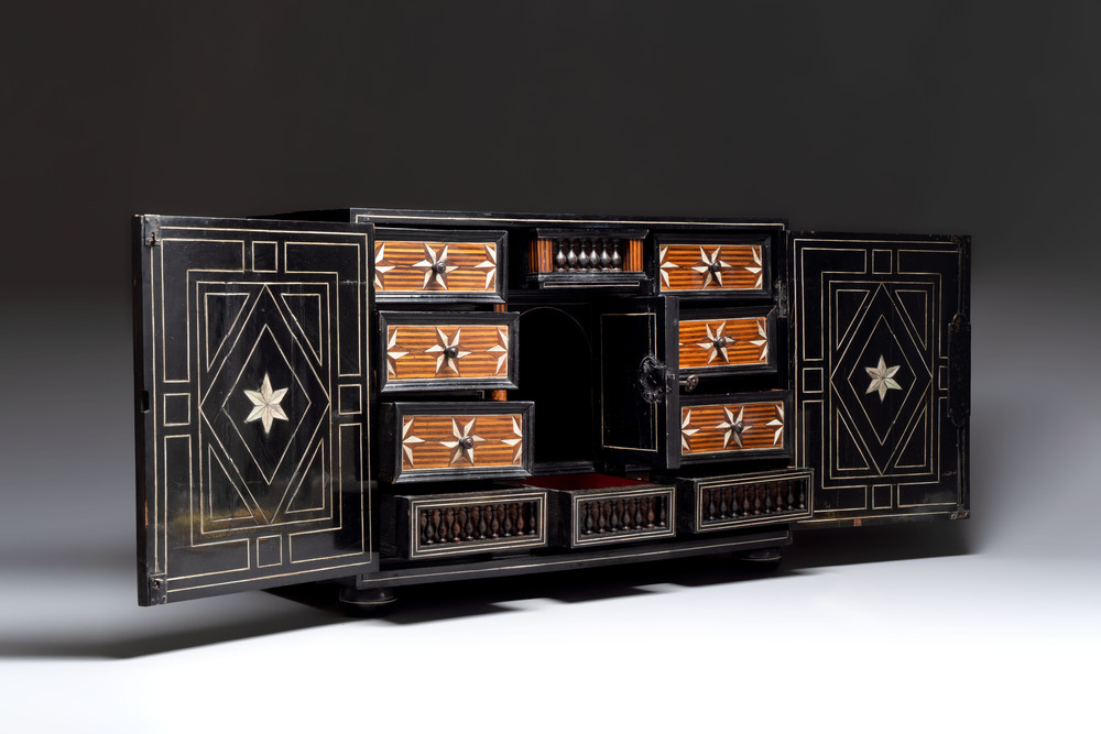 A fine ebony-veneered bone-inlaid cabinet, probably Italy, 19th C.