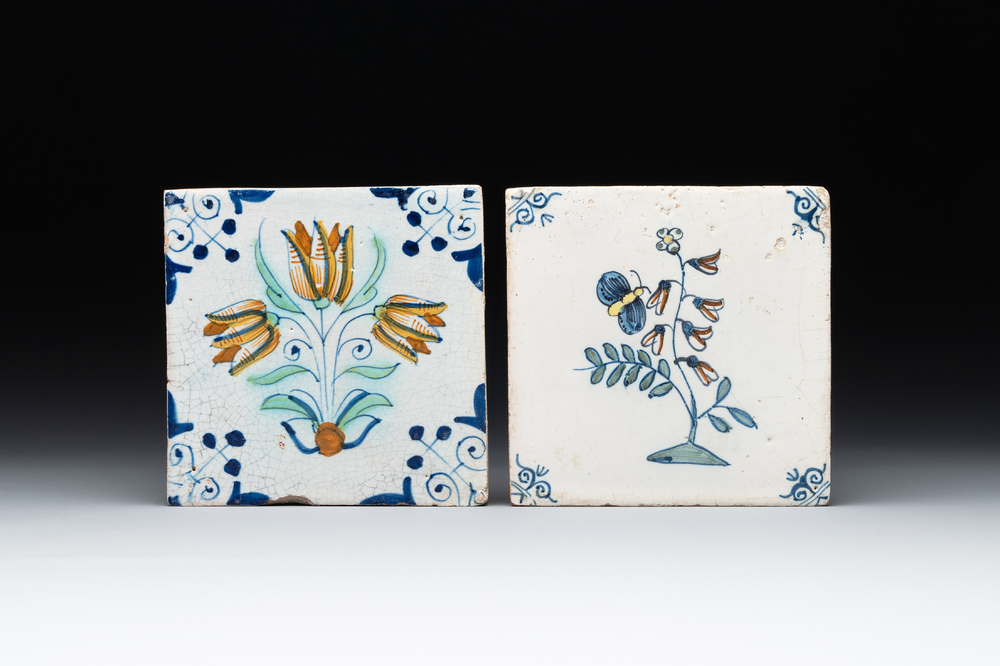Two polychrome Dutch Delft 'flower' and 'butterfly and flower' tiles, 17th C.