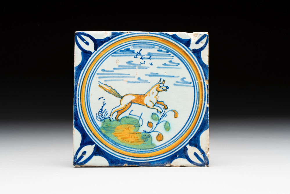 A polychrome Dutch Delft maiolica 'fox' medallion tile, 2nd half 16th C.