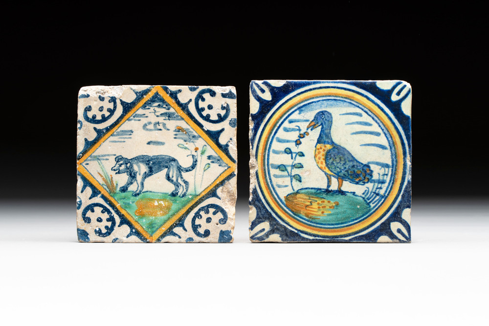 A polychrome Dutch Delft maiolica 'dog' diamond tile and a 'bird' medallion tile, late 16th C.