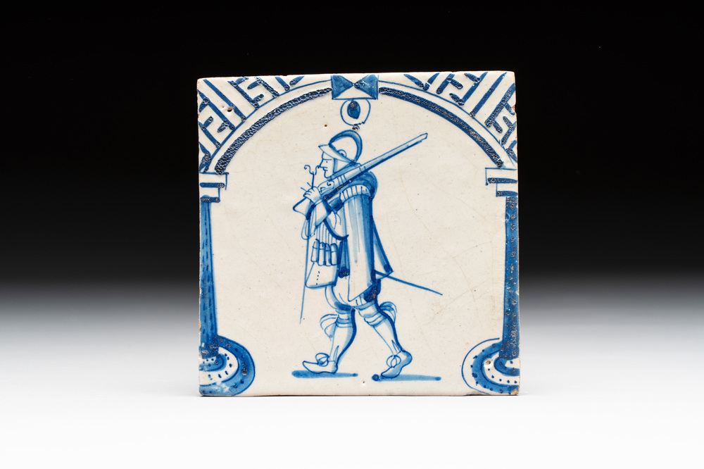 A fine blue and white Dutch Delft 'soldier' 'gate' tile, 17th C.