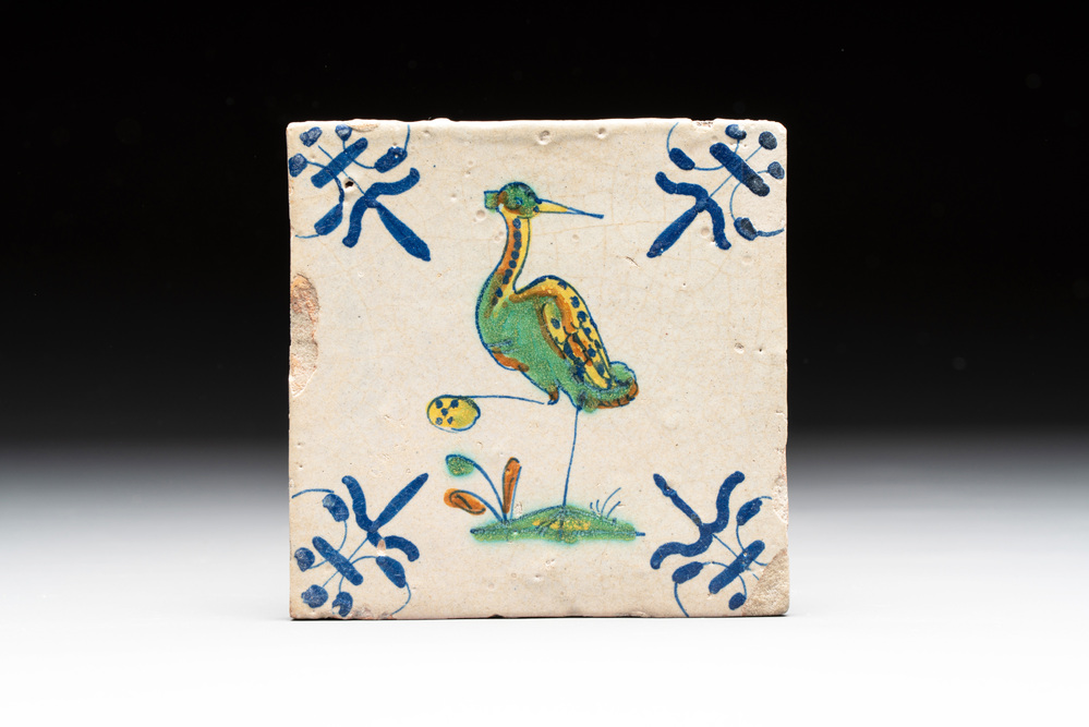 A polychrome Dutch Delft 'heron' tile, 17th C.