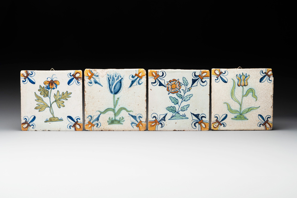 Four polychrome Dutch Delft 'flower' tiles, 17th C.