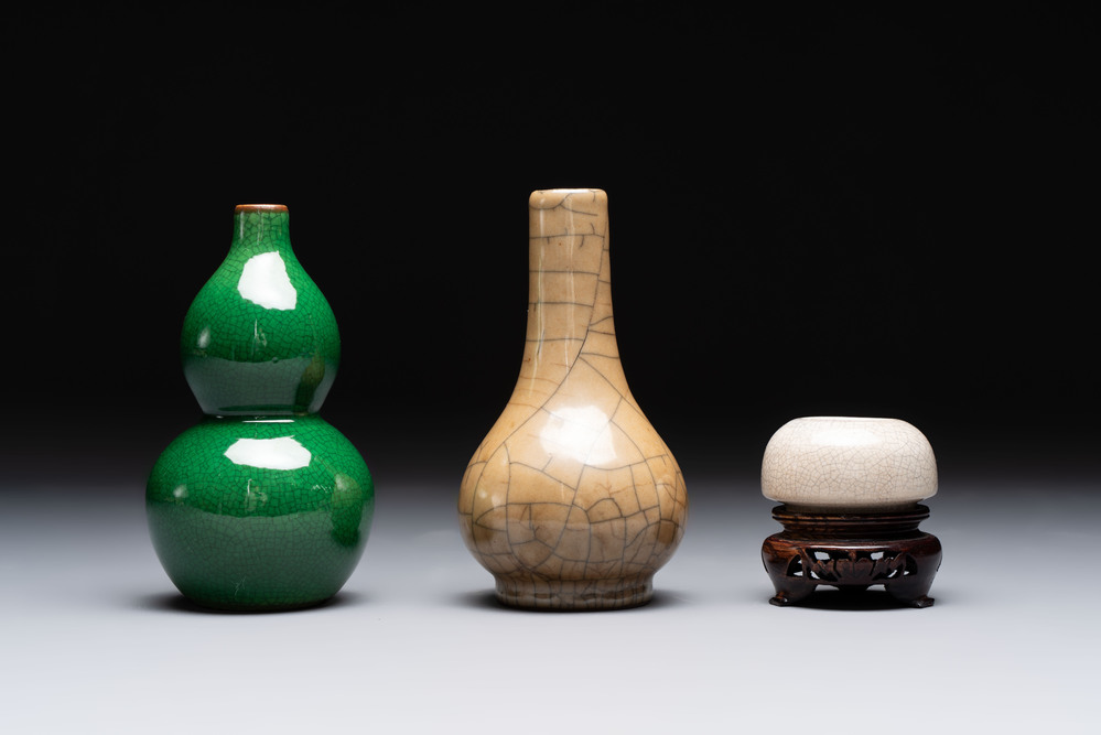 Two Chinese monochrome vases and a water pot on wooden stand, 19/20th C.