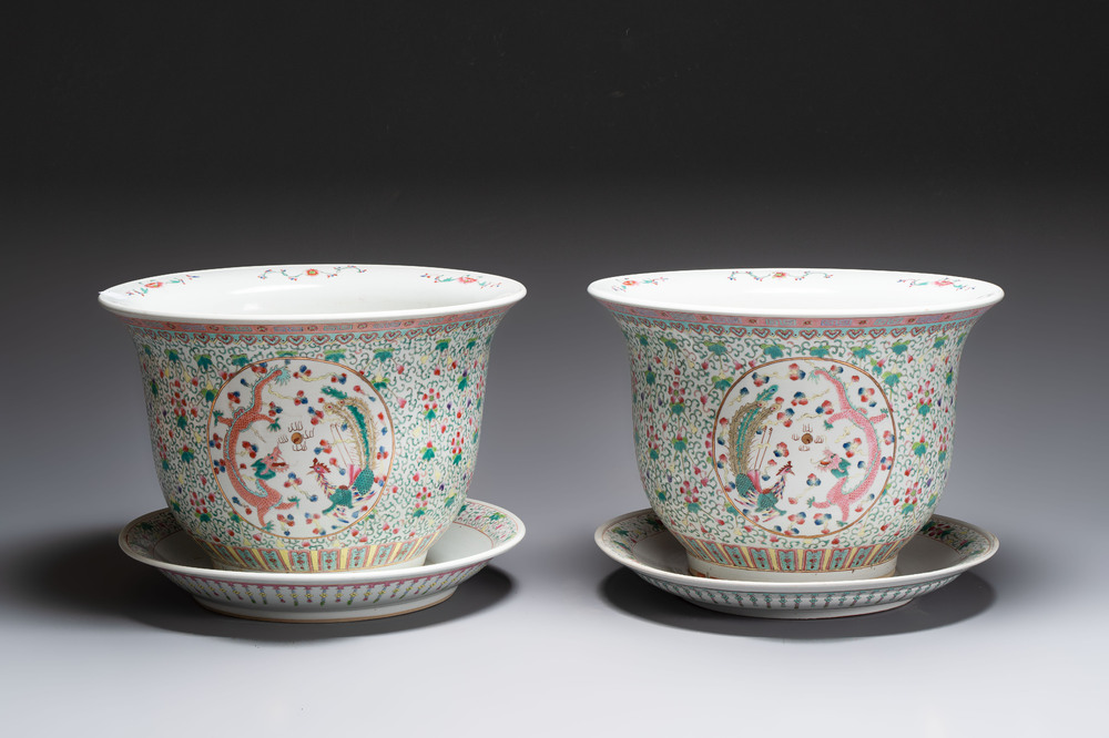 A pair of large Chinese famille rose 'dragon and phoenix' jardini&egrave;res and stands, 20th C.