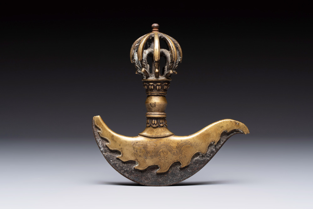 A Tibetan brass and iron kartika with incised dragon design, 19th C.