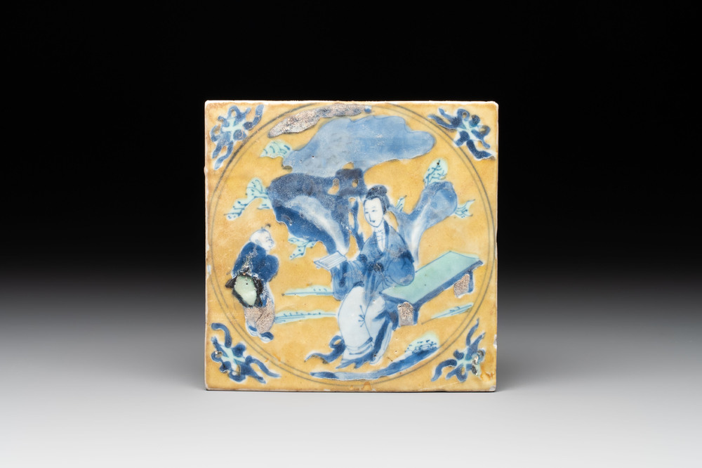 A Chinese green-and-yellow-enamelled blue and white 'Long Eliza' tile, Kangxi