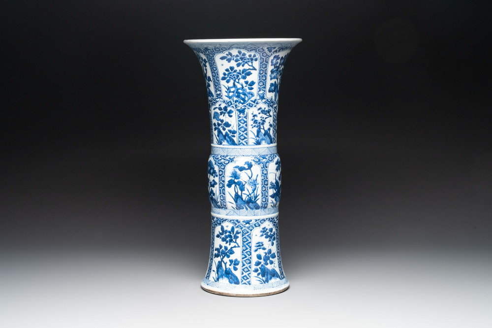 A Chinese blue and white 'gu' vase with floral design, Kangxi