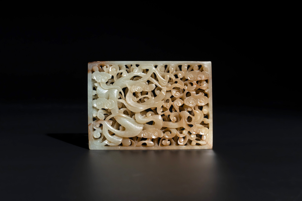 A Chinese russet jade 'dragon' plaque, 18th C.